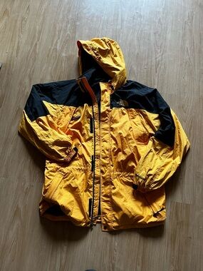 The North Face Yellow and Black Hooded Outdoor Shell Jacket